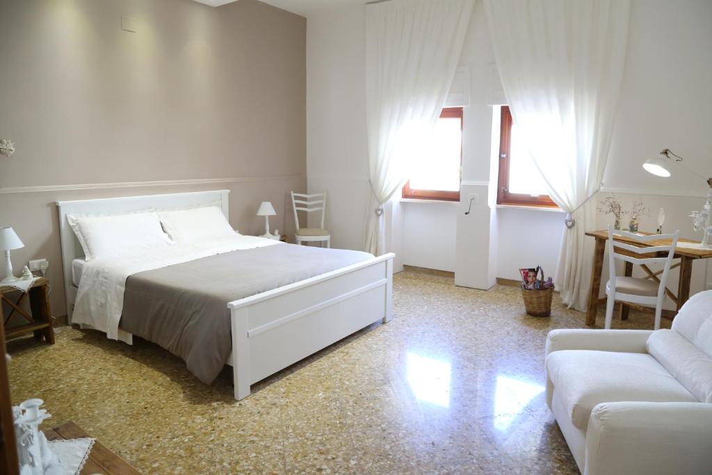 Postel nebo postele na pokoji v ubytování Virò House