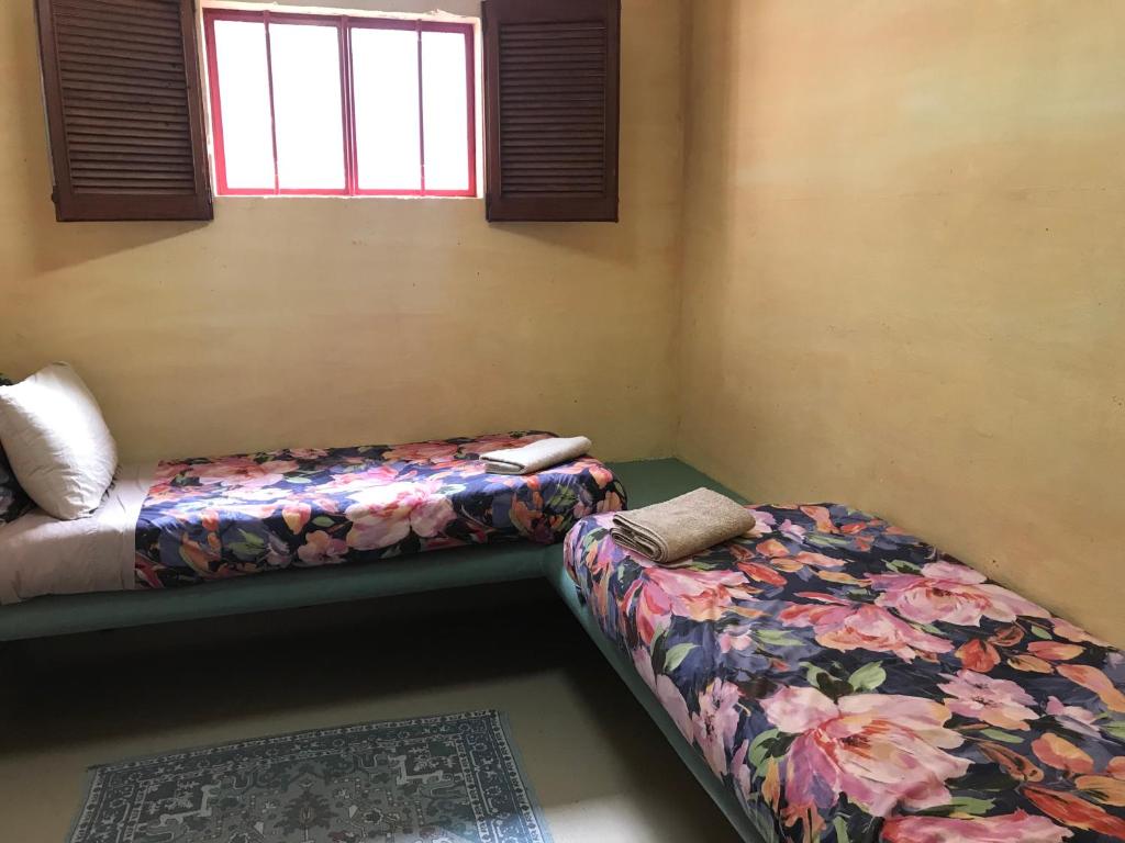 Postel nebo postele na pokoji v ubytování The Cell Block Backpackers