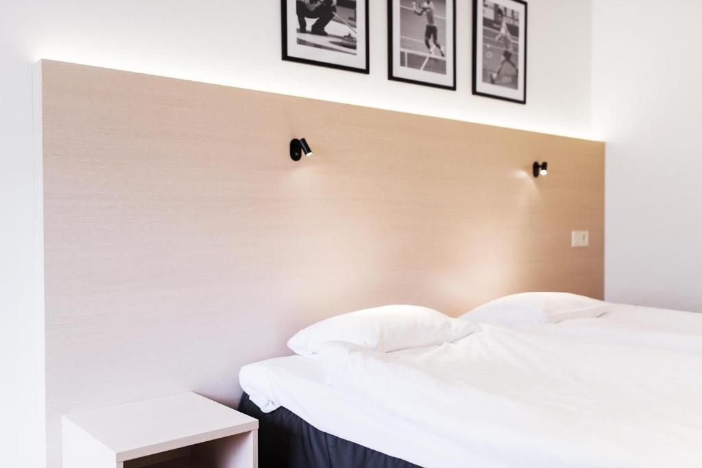Postel nebo postele na pokoji v ubytování Best Western RC Hotel
