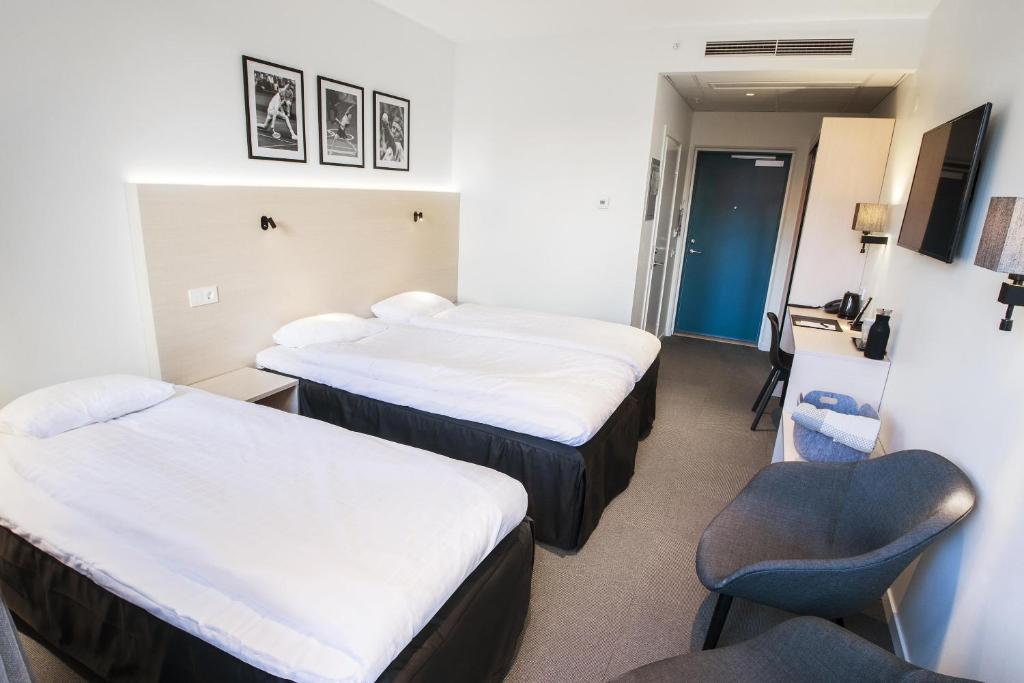 Postel nebo postele na pokoji v ubytování Best Western RC Hotel