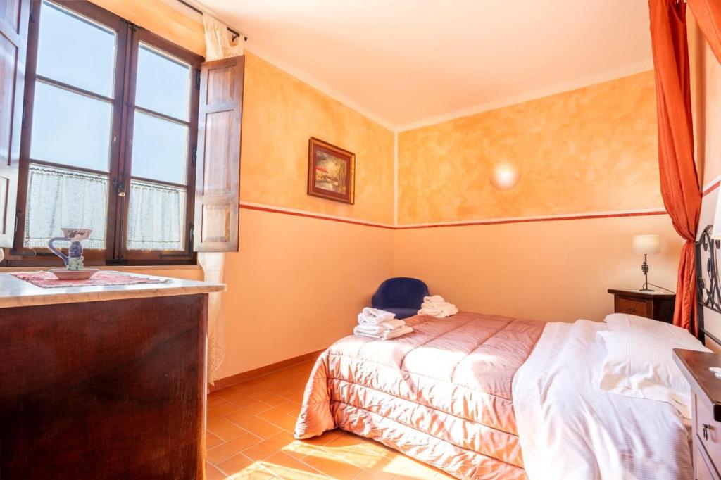 Postel nebo postele na pokoji v ubytování I Chiari