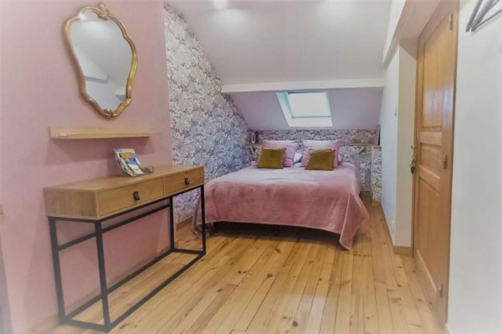 Posteľ alebo postele v izbe v ubytovaní La Maison de Sylvie, chambres d'hôtes à Tarbes