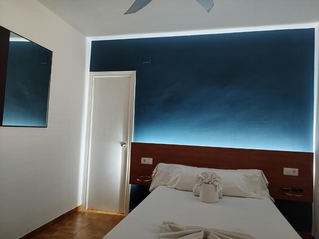 Postel nebo postele na pokoji v ubytování Nou Rocamar
