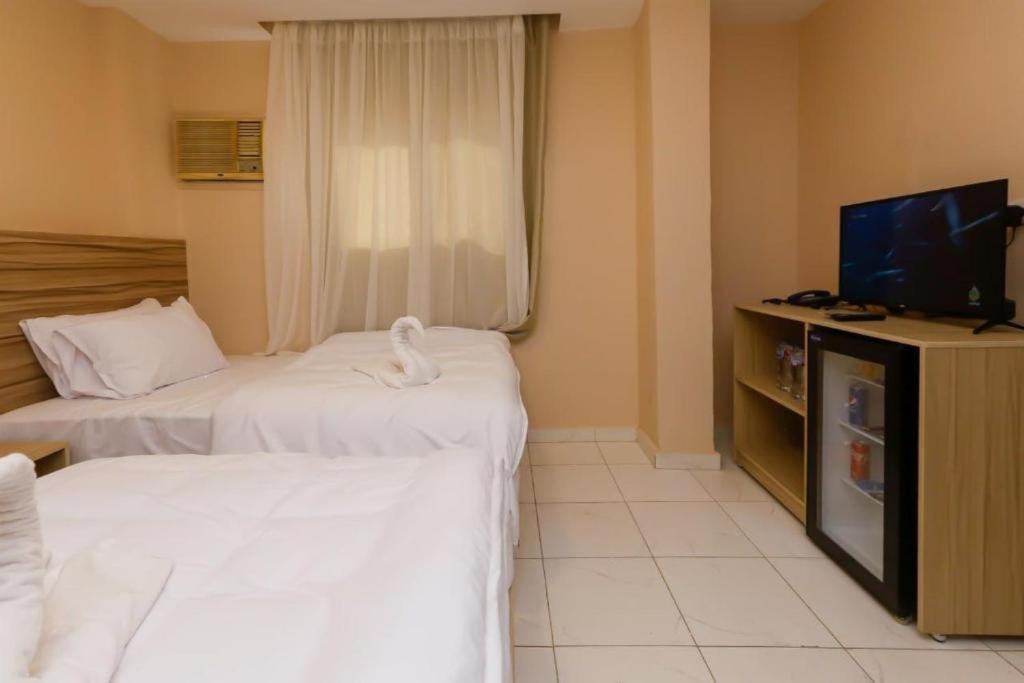 TV a/nebo společenská místnost v ubytování Rizkyan pyramids view INN