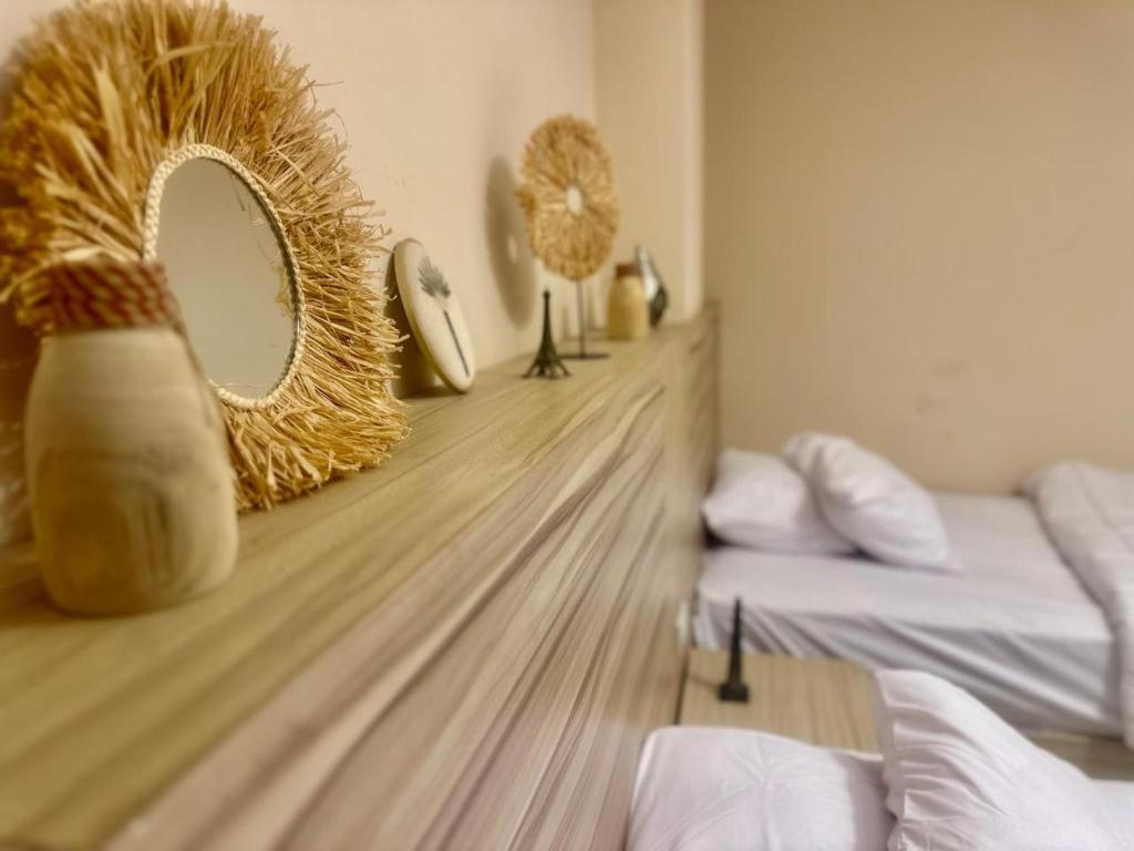 Postel nebo postele na pokoji v ubytování Rizkyan pyramids view INN