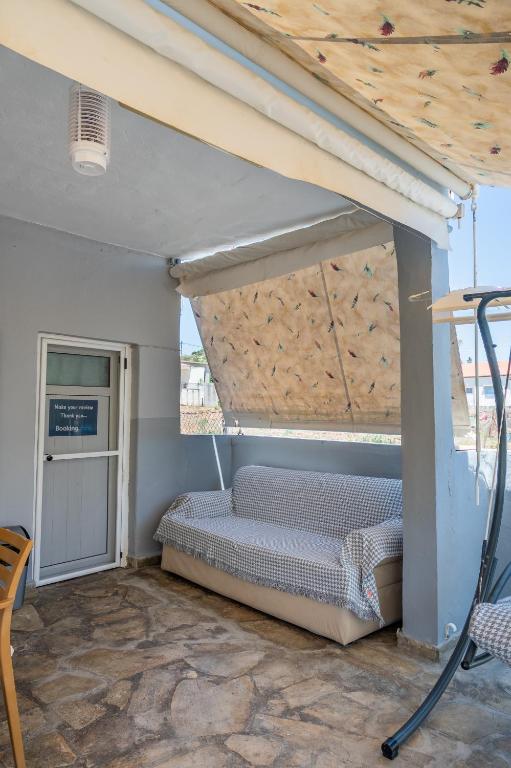 Кровать или кровати в номере Dimitri's Apartment