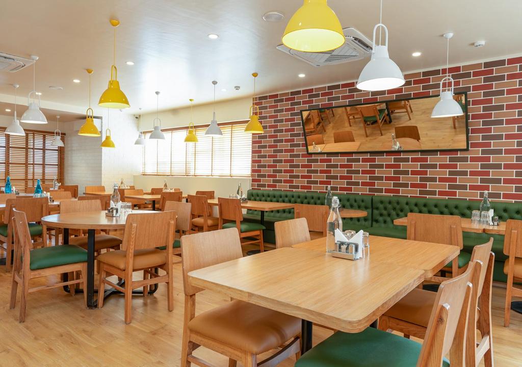 Restaurace v ubytování Bloom Hotel Balewadi