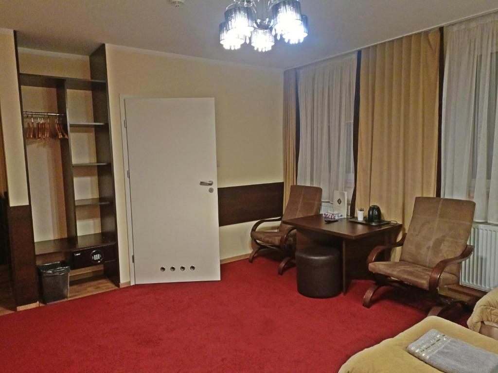 Posezení v ubytování Hotel Ajax