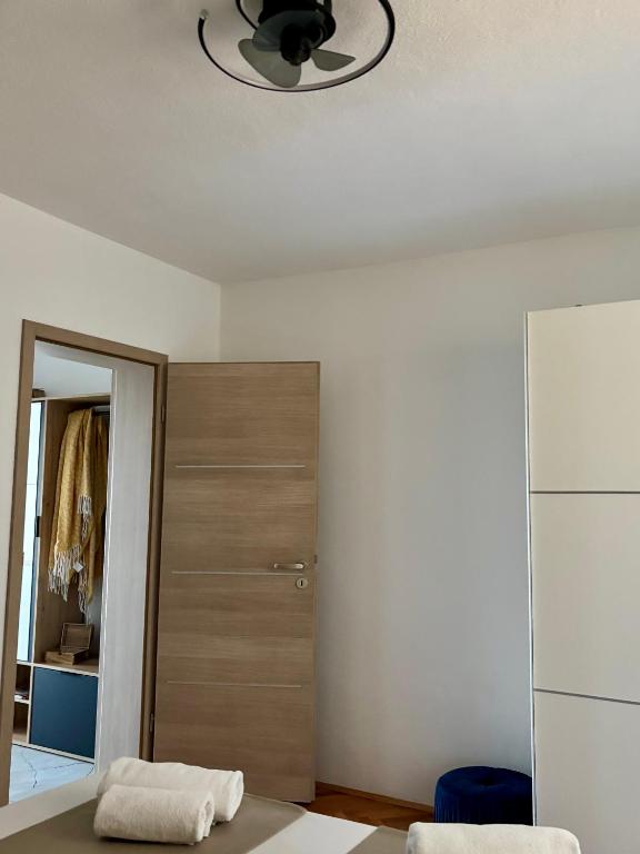 Posteľ alebo postele v izbe v ubytovaní Apartments ONE PALM