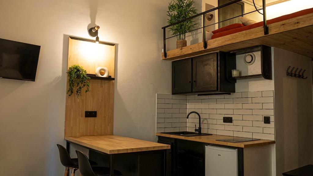 Kuchyň nebo kuchyňský kout v ubytování Studio Cozy en plein centre ville