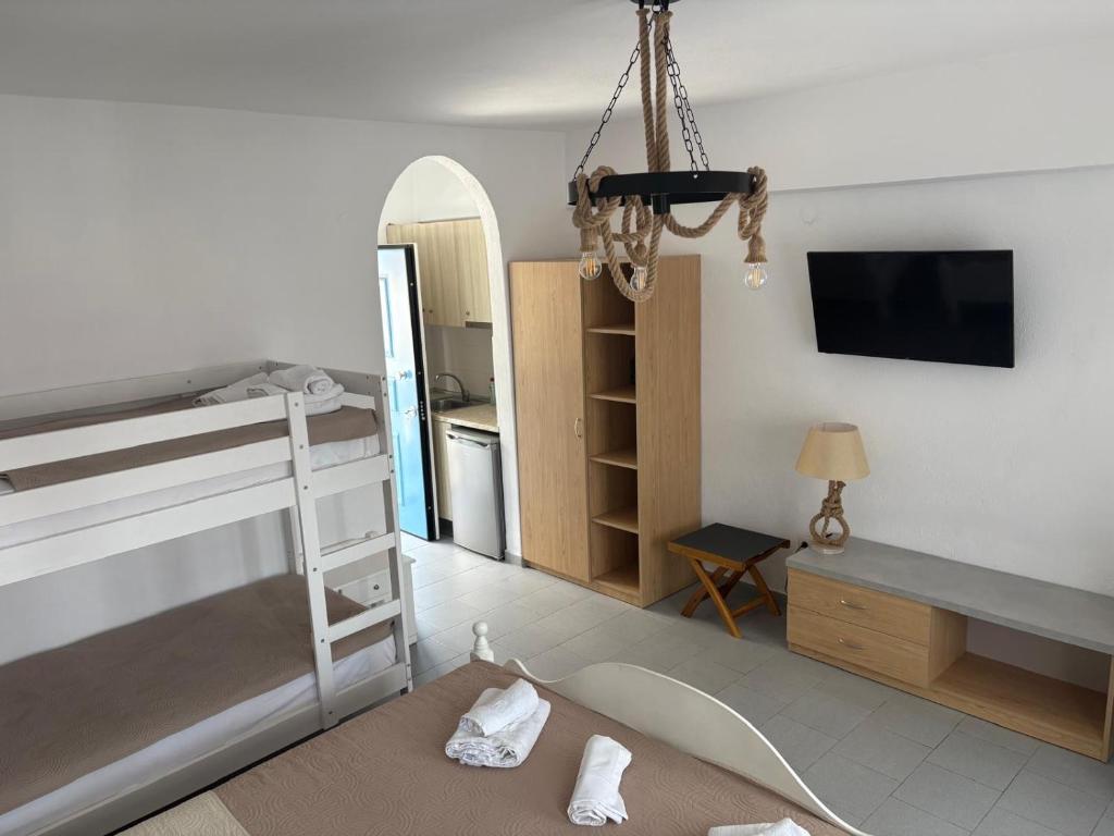 Postel nebo postele na pokoji v ubytování Astri Hotel