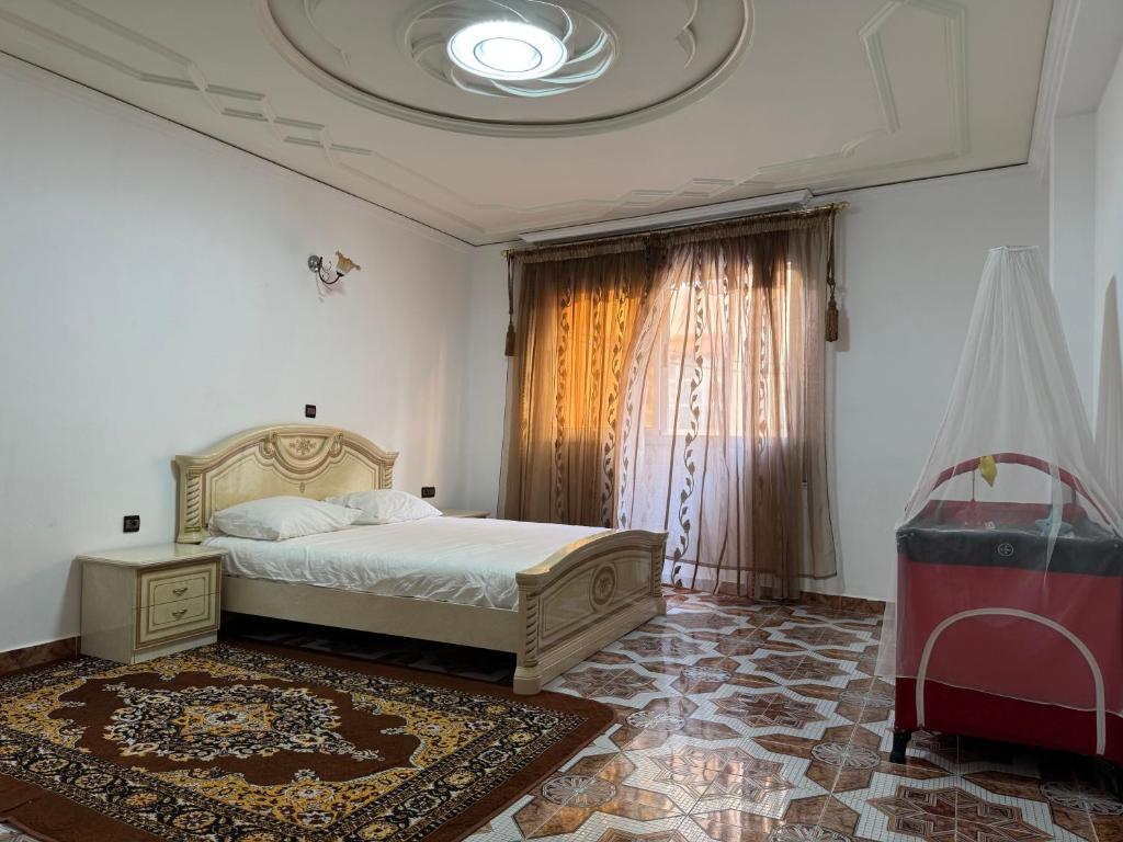 Postel nebo postele na pokoji v ubytování Appartements dior al hoceima
