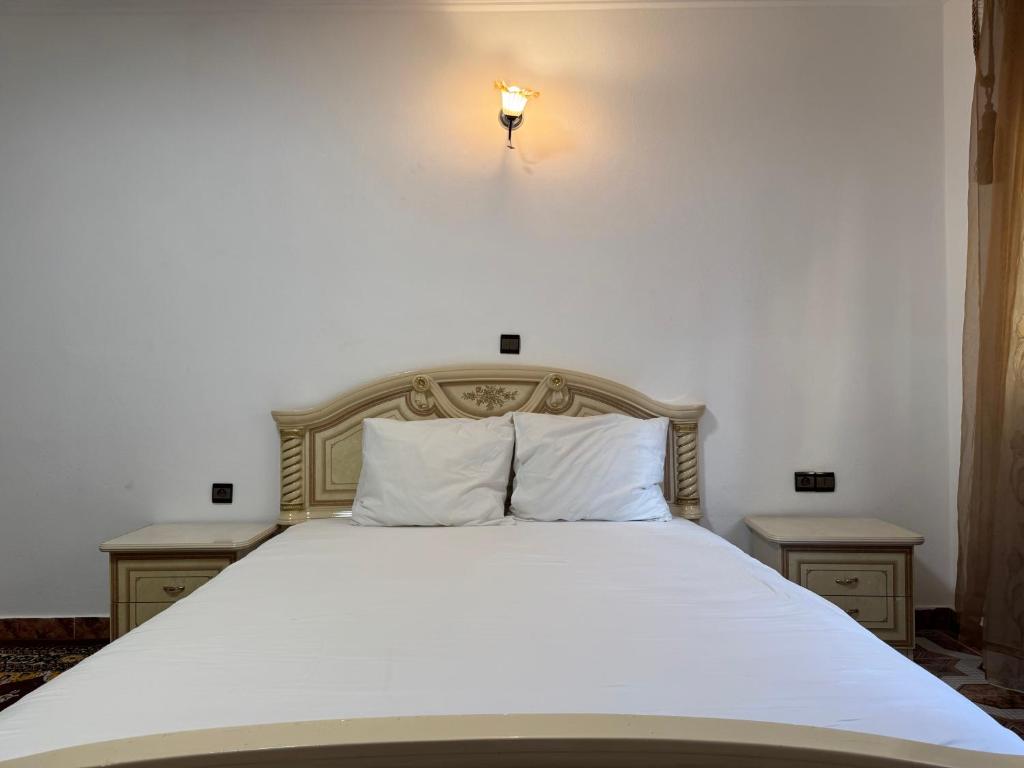 Postel nebo postele na pokoji v ubytování Appartements dior al hoceima