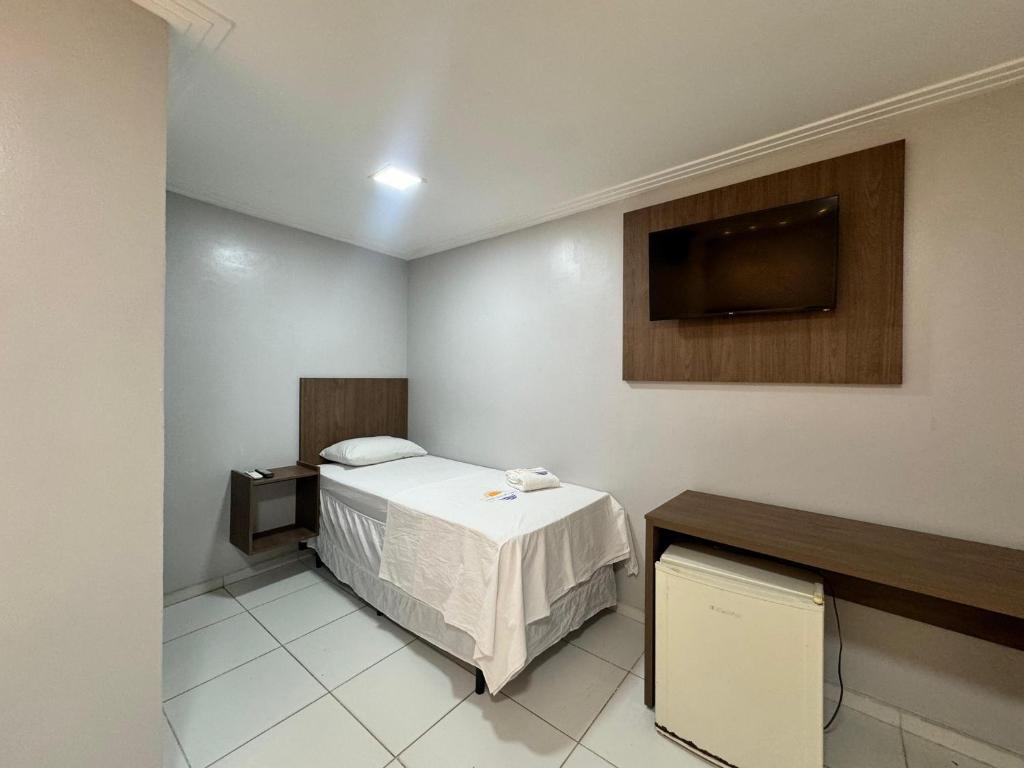 Postel nebo postele na pokoji v ubytování Hotel Luar de Itapua