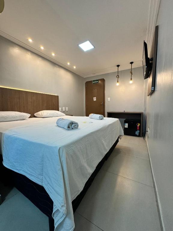 Postel nebo postele na pokoji v ubytování Hotel Luar de Itapua