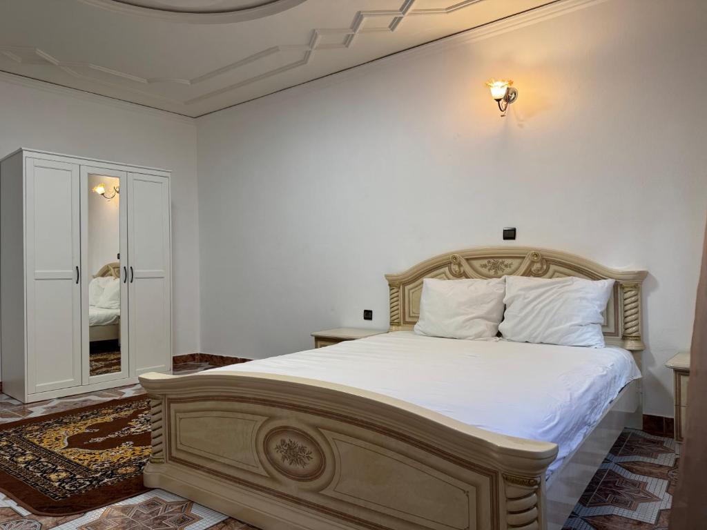 Postel nebo postele na pokoji v ubytování Appartements dior al hoceima