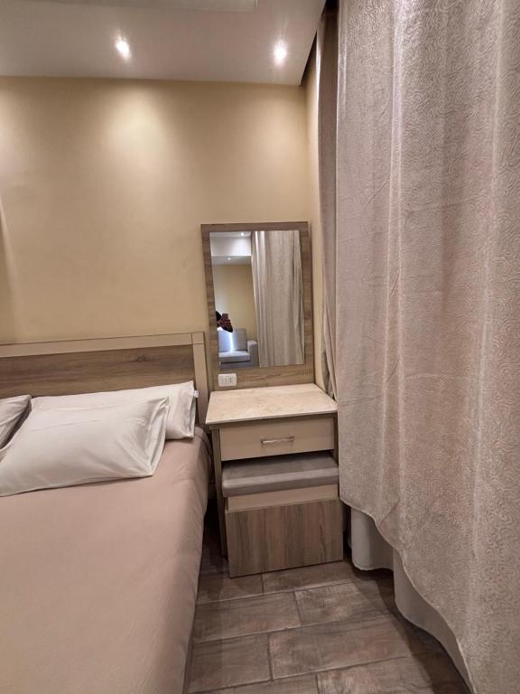 Postel nebo postele na pokoji v ubytování Hassan Pyramids Hotel