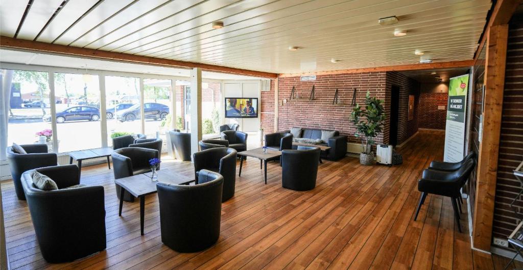 Posezení v ubytování Hotel Lynggaarden