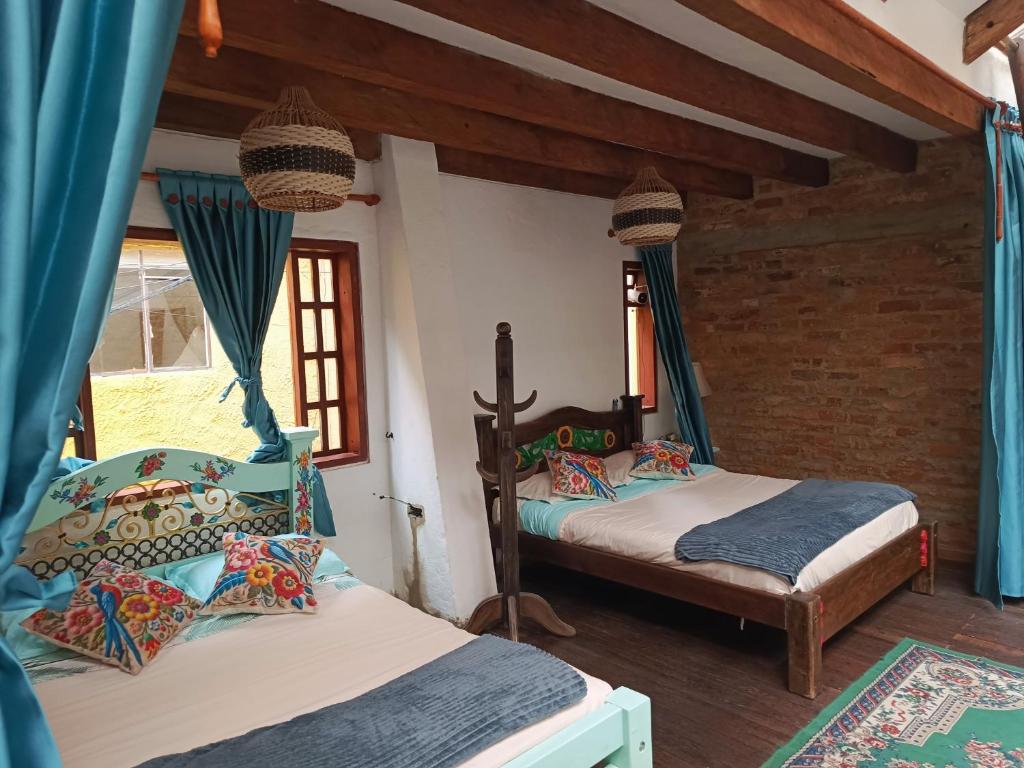 Postel nebo postele na pokoji v ubytování Usaquen Station Hostel