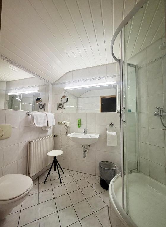 Koupelna v ubytování Hotel Wasserfall