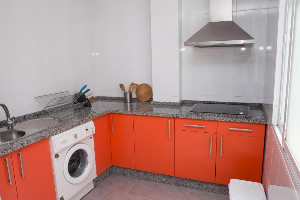 Kuchyň nebo kuchyňský kout v ubytování Apartamentos Chuita Playa