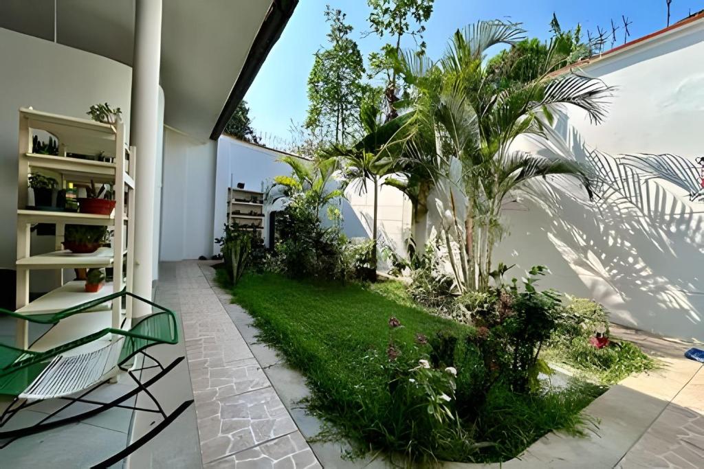 Κήπος έξω από το Vive a 5min del centro 3HAB con A/C Cochera Jardín