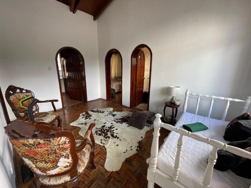 Postel nebo postele na pokoji v ubytování Accommodation in Quito