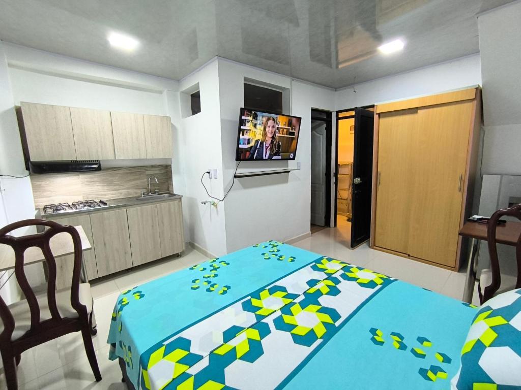 Una cocina o kitchenette en Cómodos y acogedores Apartaestudios - Manizales