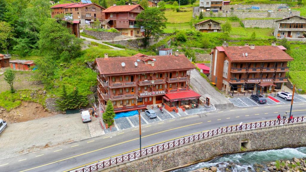 an overhead view of a building next to a road at Meric Hotel in Uzungöl