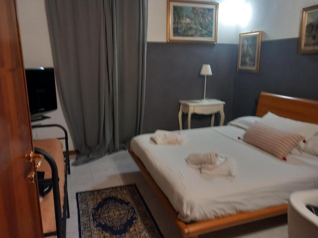 Postel nebo postele na pokoji v ubytování intero alloggio 2 camere matrimoniali