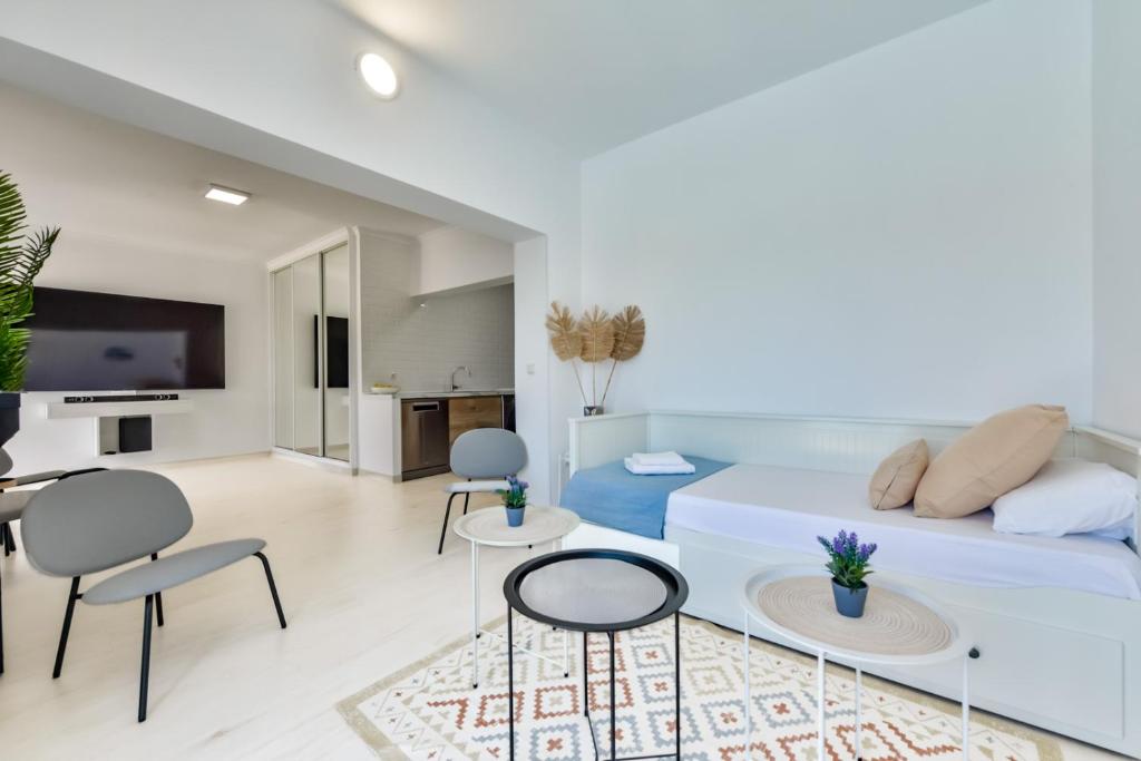 A bed or beds in a room at Villas Guzman - Alex