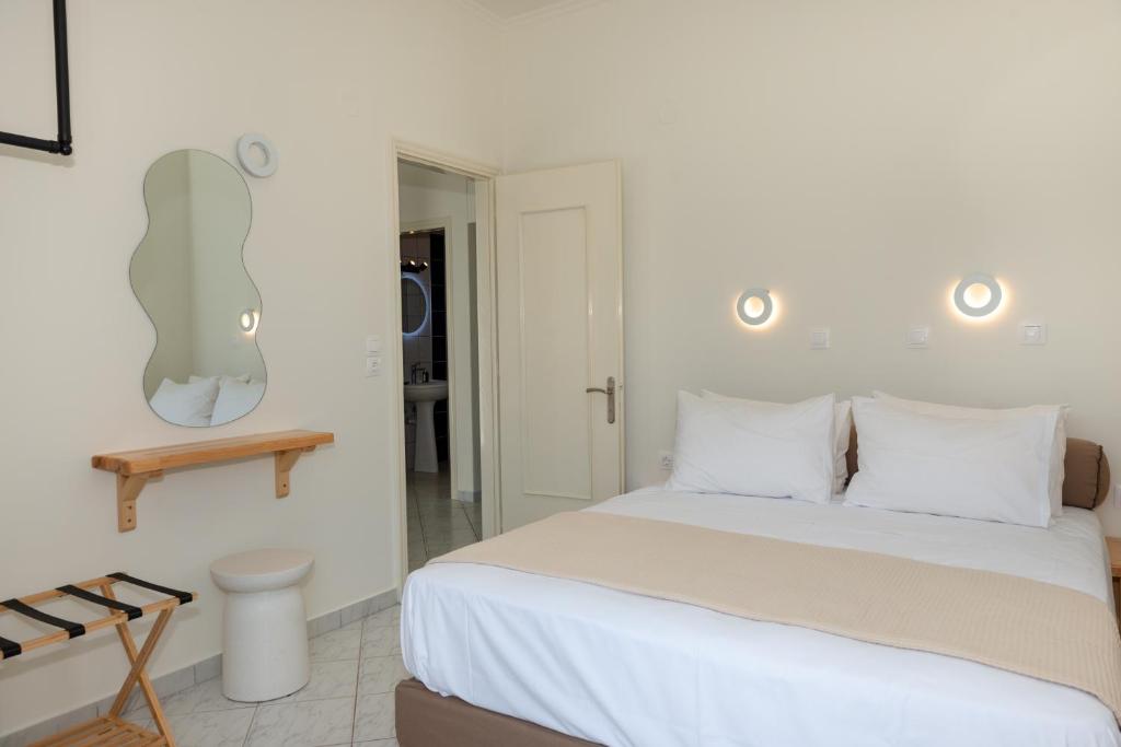 Postel nebo postele na pokoji v ubytování Ellinas Hotel