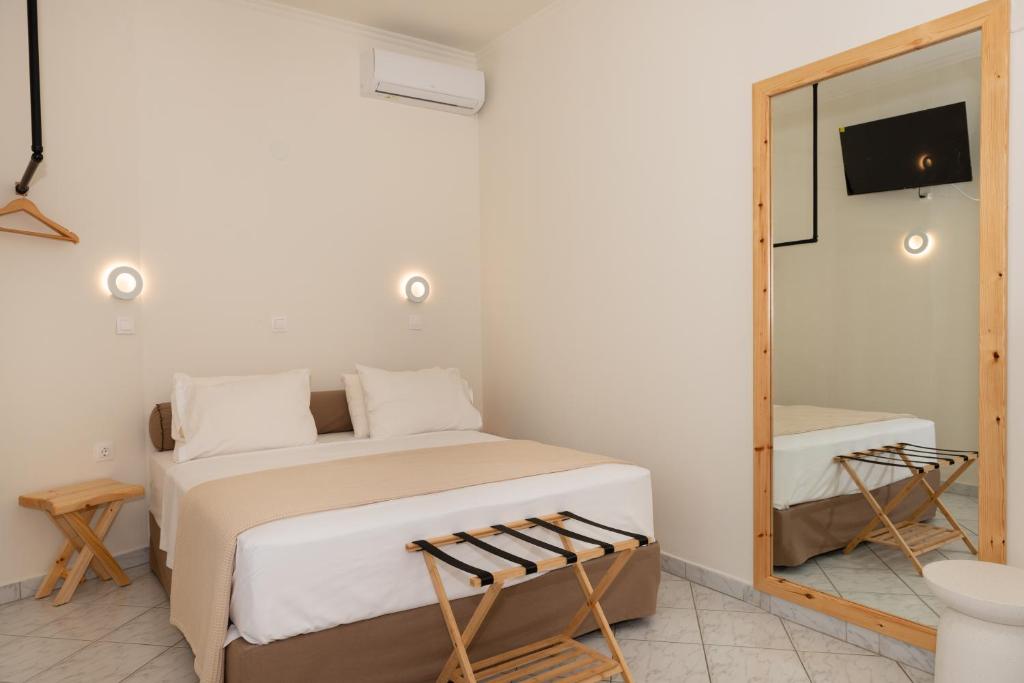 Postel nebo postele na pokoji v ubytování Ellinas Hotel