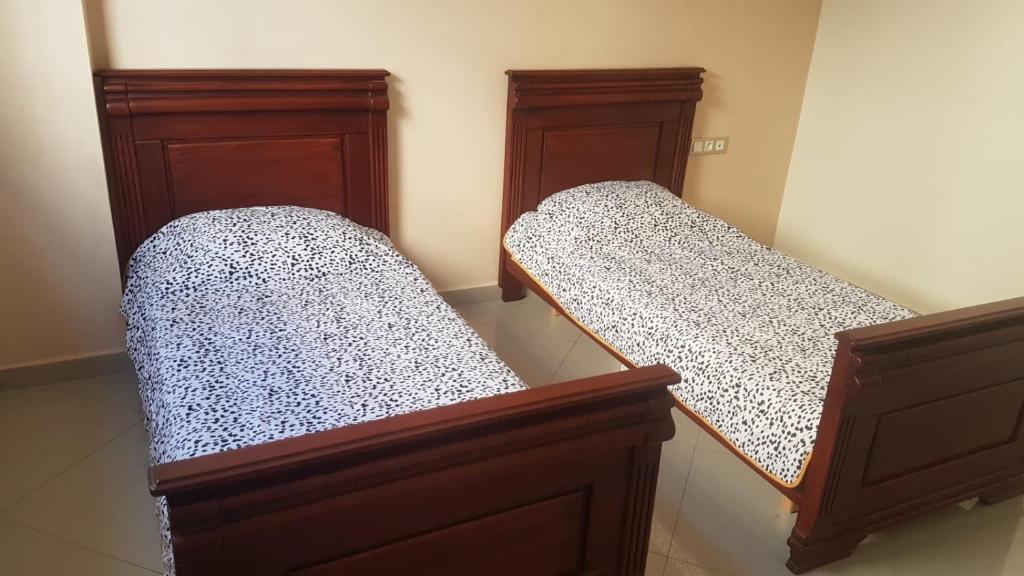 Postel nebo postele na pokoji v ubytování Ajdir
