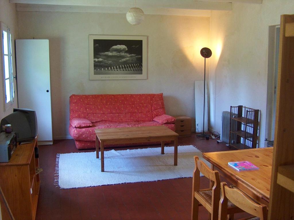 Posezení v ubytování Chalet au coeur d'un parc de 4 ha