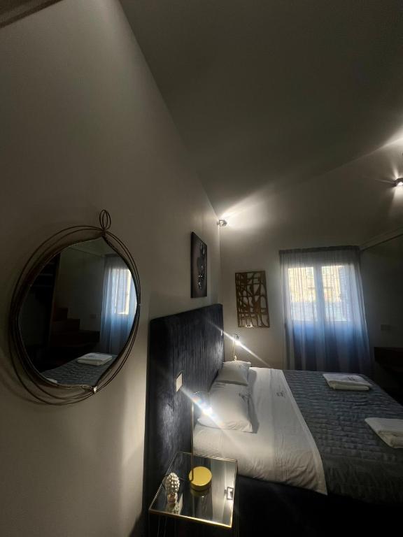 Postel nebo postele na pokoji v ubytování Atenea Palace Luxury Rooms - Atenea Collection