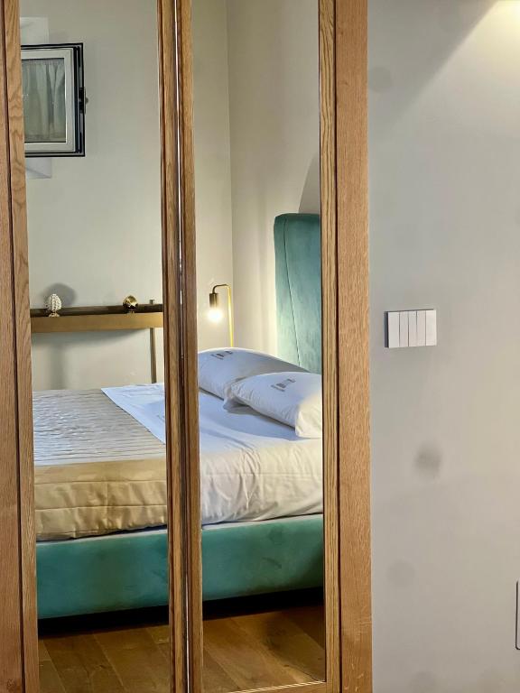 Postel nebo postele na pokoji v ubytování Atenea Palace Luxury Rooms - Atenea Collection