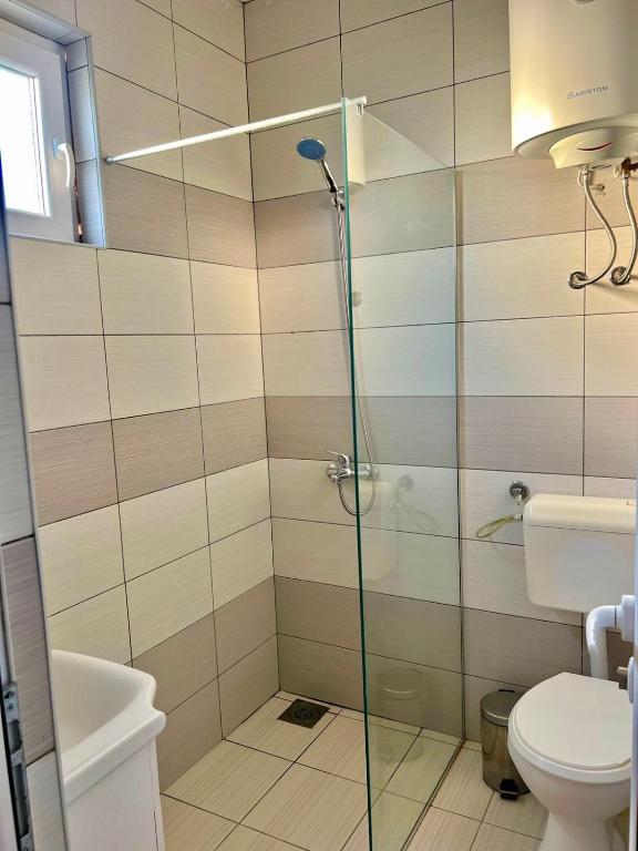 Koupelna v ubytování Apartments Katana