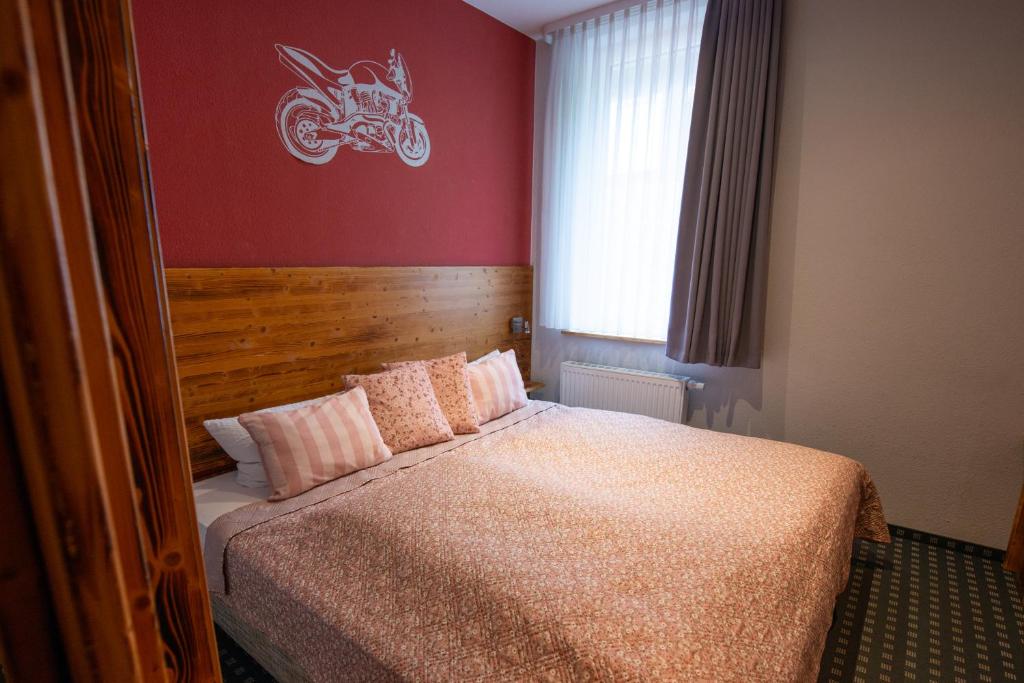 Postel nebo postele na pokoji v ubytování Dein Hotel