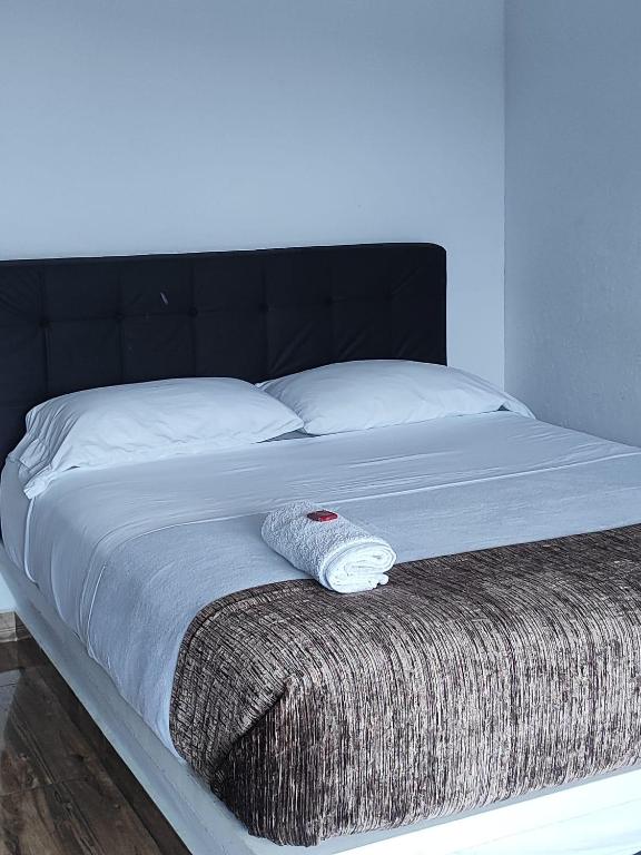 Postel nebo postele na pokoji v ubytování Hotel maripipark