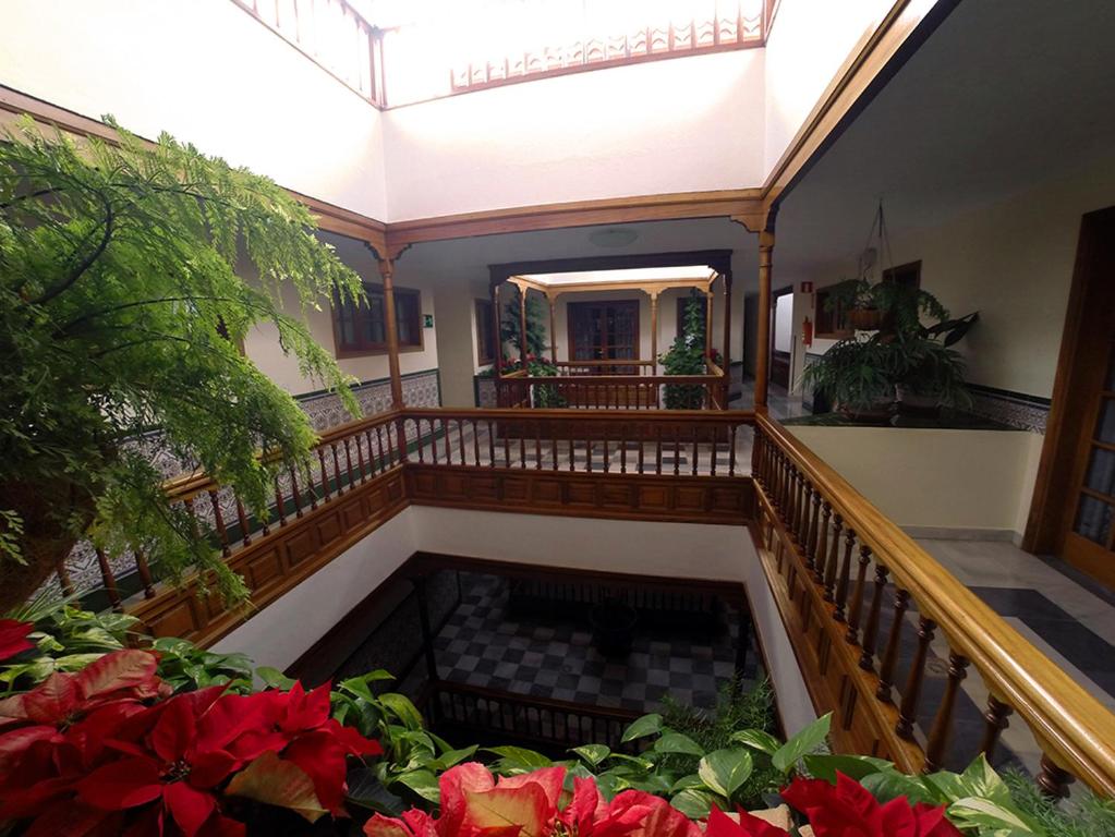 an image of a staircase in a building at Apartamentos Tapahuga in Playa de Santiago