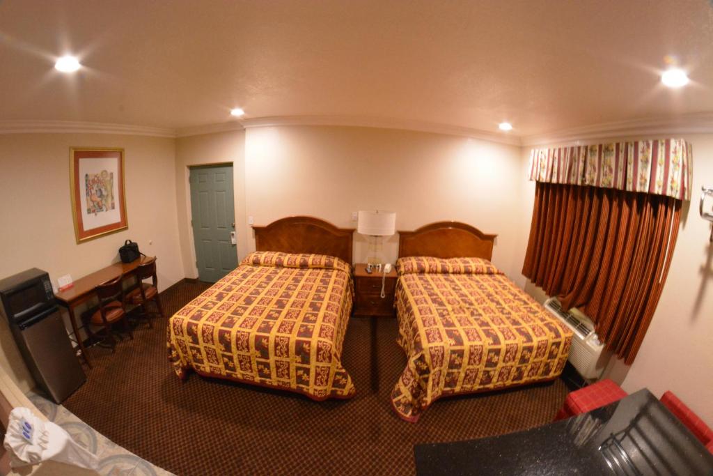 The Palace Inn - Chambre Double Avec Deux Lits Doubles