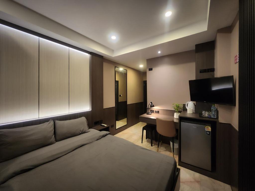 TV a/nebo společenská místnost v ubytování Max Residence