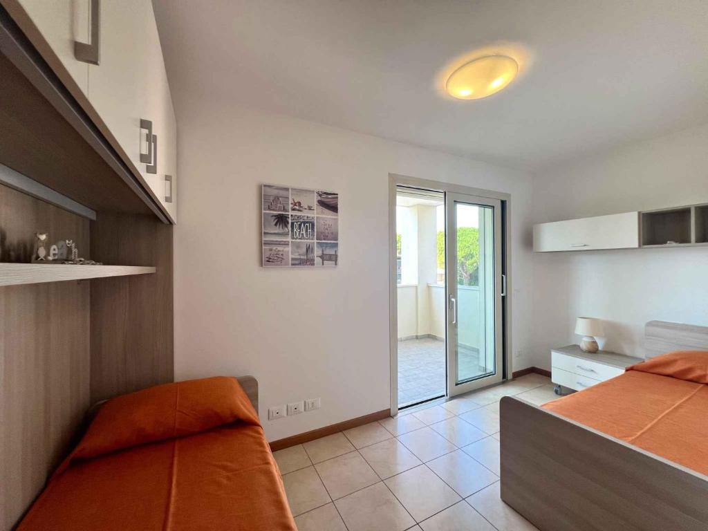 Fotografia z galérie ubytovania Apartment in Lignano Sabbiadoro 21787 v Lignano Sabbiadoro