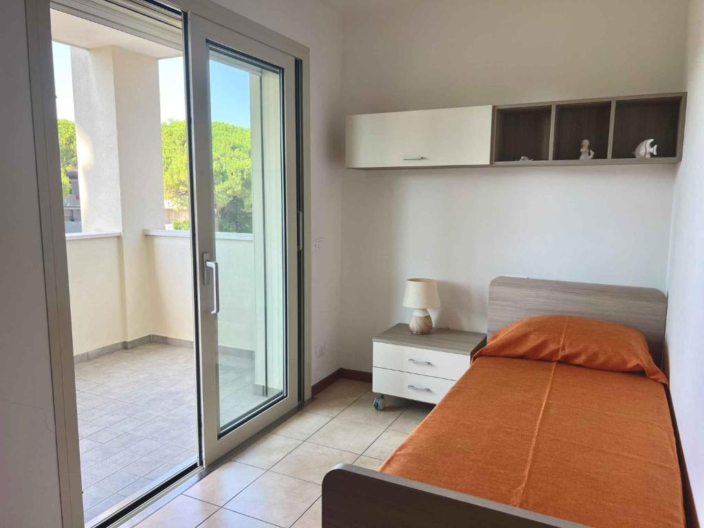 Fotografia z galérie ubytovania Apartment in Lignano Sabbiadoro 21787 v Lignano Sabbiadoro