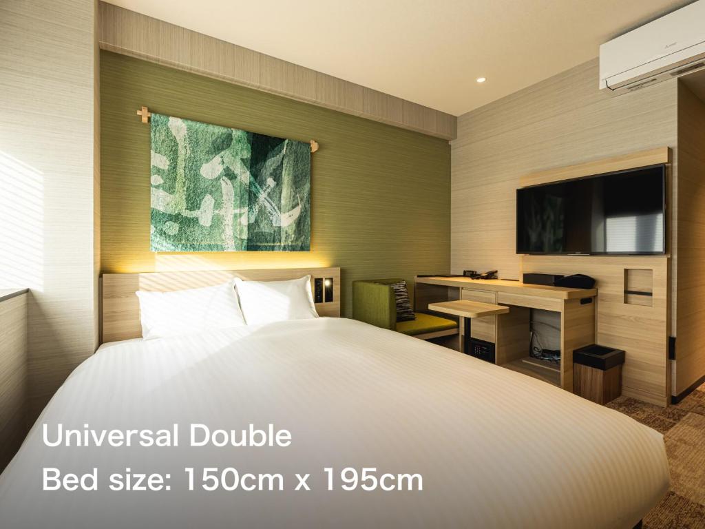 Postel nebo postele na pokoji v ubytování La'gent Hotel Kyoto Nijo