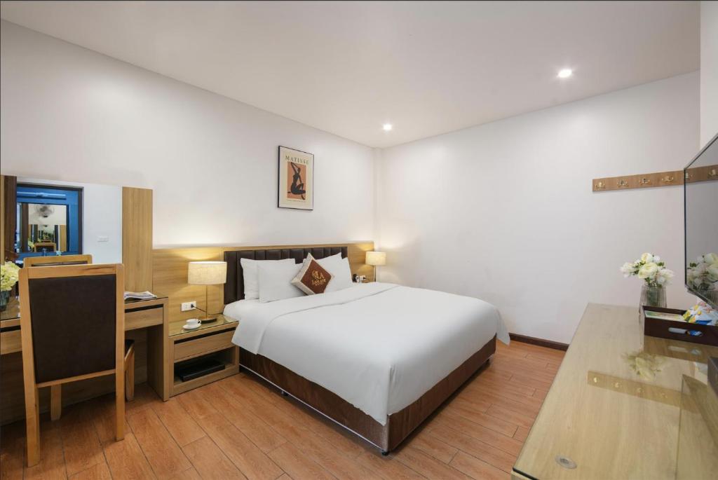 Postel nebo postele na pokoji v ubytování Lam Anh Hotel 3 Ngoại Giao Đoàn BT5-16