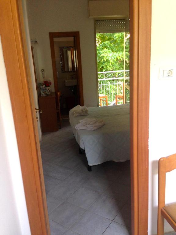 Postel nebo postele na pokoji v ubytování Hotel Jole