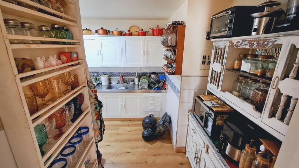 Kuchyň nebo kuchyňský kout v ubytování Habitación Privada en Apartamento, Conquistadores
