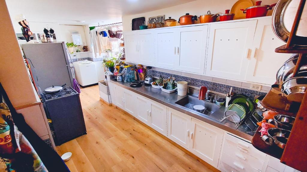 Kuchyň nebo kuchyňský kout v ubytování Habitación Privada en Apartamento, Conquistadores